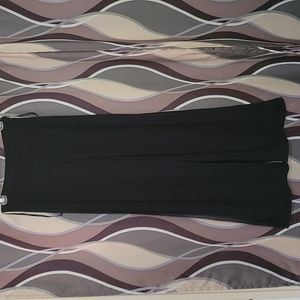 Connected black pants with sheer panel overlays